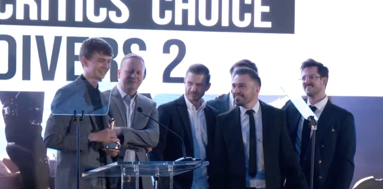 Happy faces from Arrowheads winning critics choise with Helldivers 2 - Golden Joystick Awards 2024 London