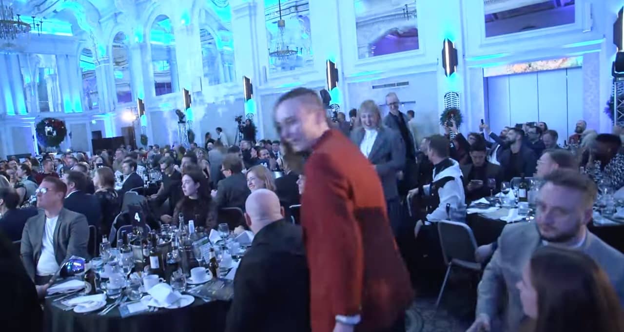 Happy winners approaching podium - Golden Joystick Awards 2024 London